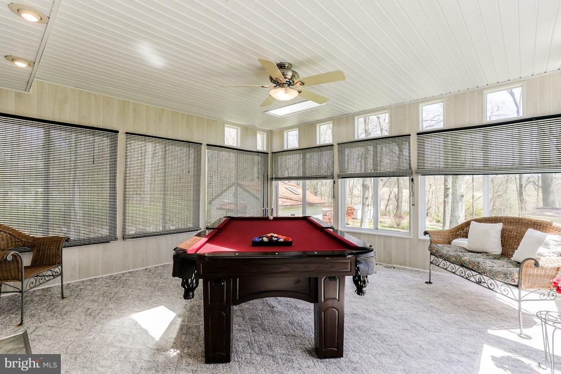 921 Emory Church Road Upperco, MD 21155 - Photo 13 of 30 a living room with furniture a table and a potted plant