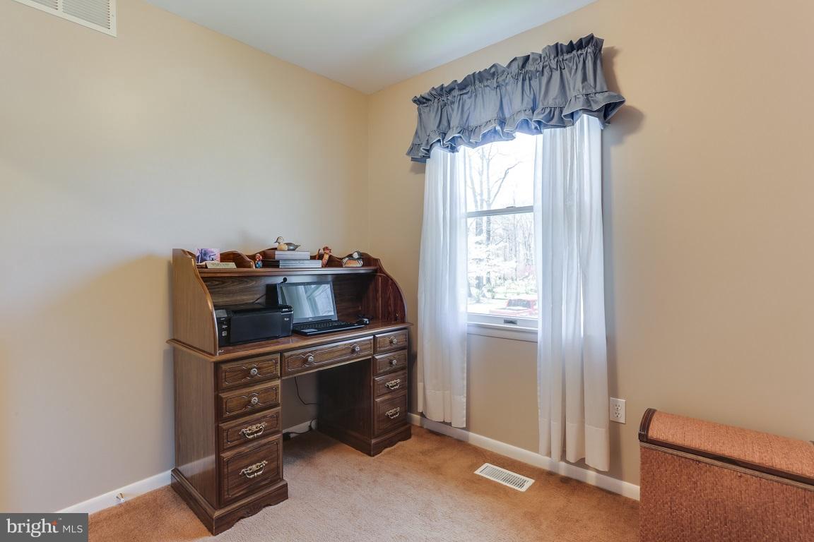 921 Emory Church Road Upperco, MD 21155 - Photo 19 of 30 a kitchen with appliances cabinets and a window