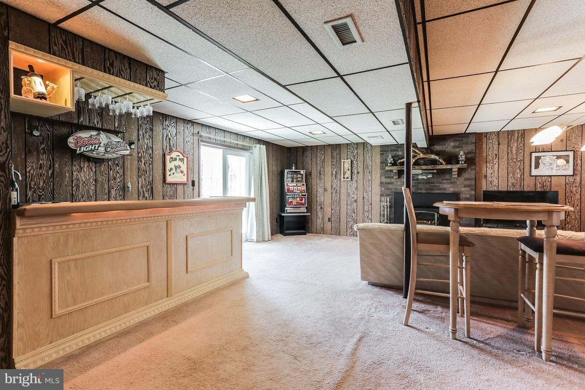 921 Emory Church Road Upperco, MD 21155 - Photo 23 of 30 a kitchen with furniture and a refrigerator