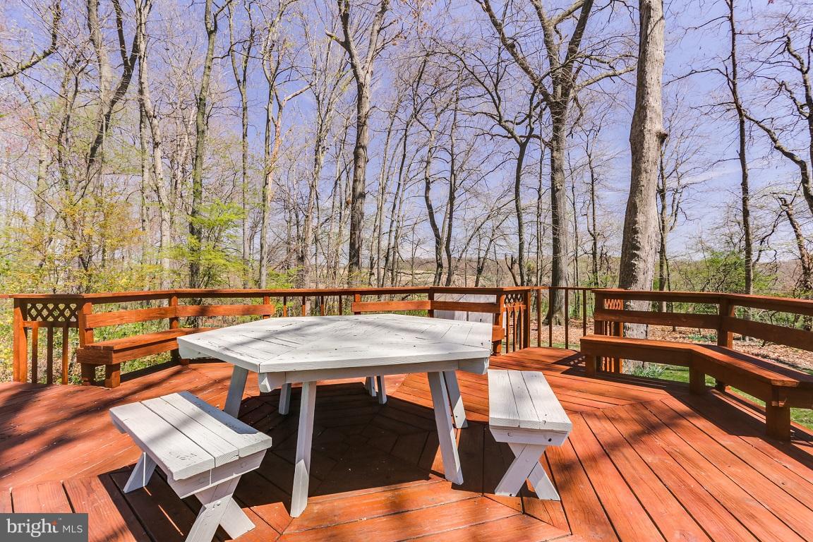 921 Emory Church Road Upperco, MD 21155 - Photo 27 of 30 a terrace with outdoor seating and trees