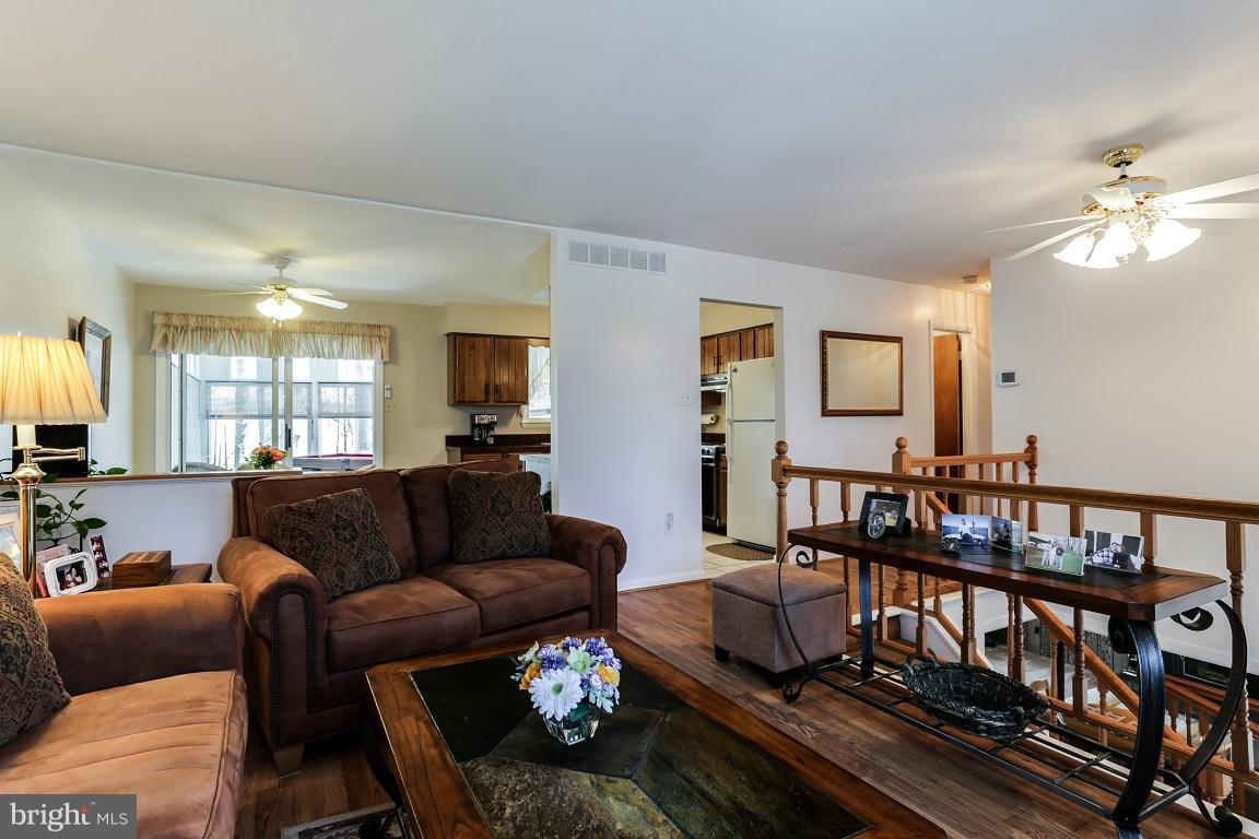 921 Emory Church Road Upperco, MD 21155 - Photo 7 of 30 a living room with furniture and a wooden floor