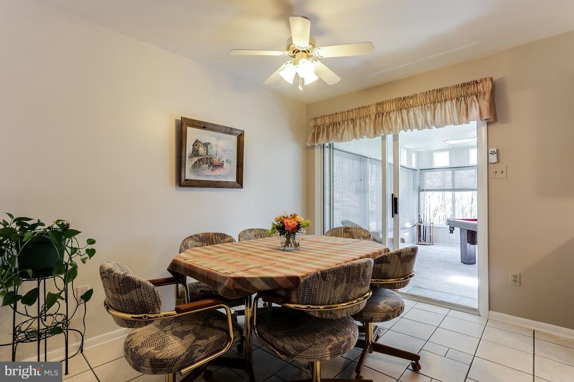 921 Emory Church Road Upperco, MD 21155 - Photo 8 of 30 a dining room with furniture and window