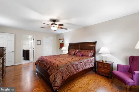 a bedroom with a bed and furniture