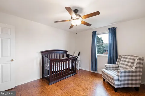 a bedroom with furniture and windows