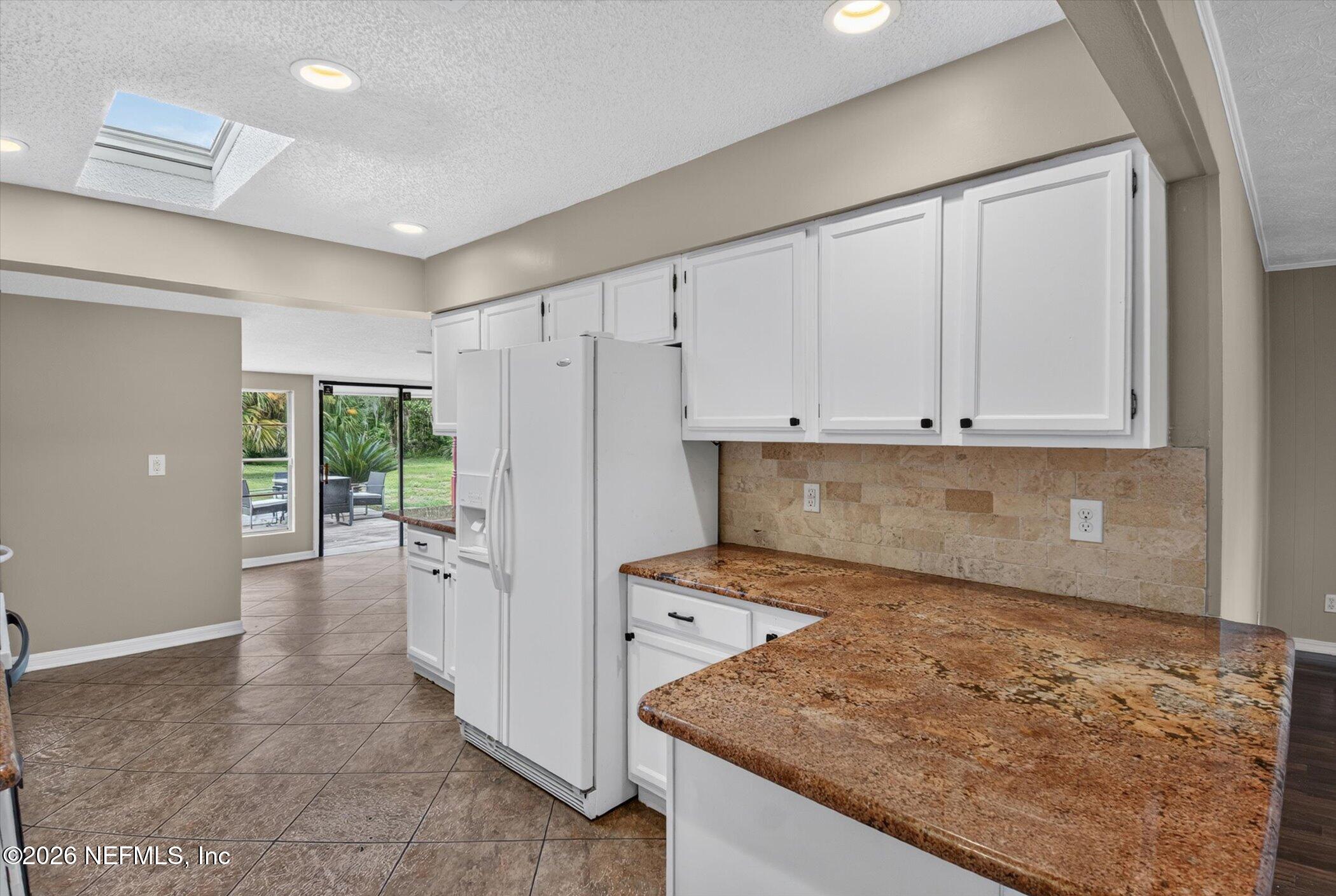 2705 Navajo Road Orange Park, FL 32073 - Photo 24 of 58 24-2705-Navajo-Rd-WindowStill-Photograph