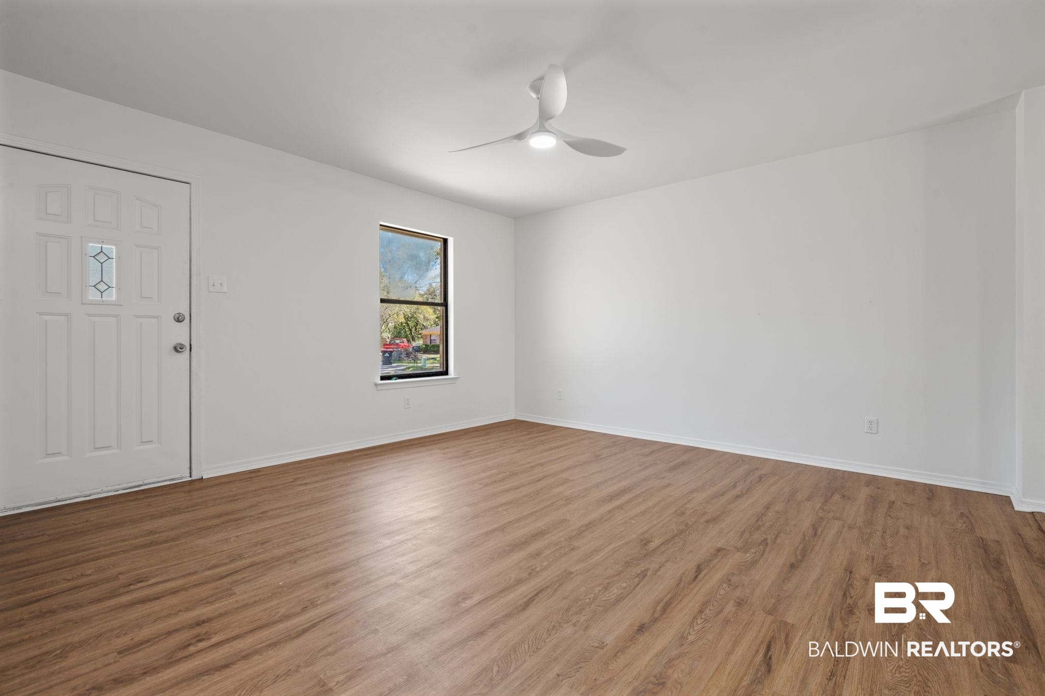 5734 Pheasant Court Theodore, AL 36582 - Photo 2 of 23 Foyer with wood finished floors and a ceiling fan