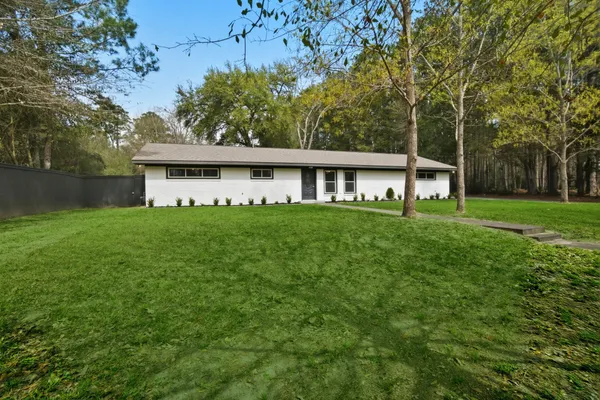 a house view with a garden space