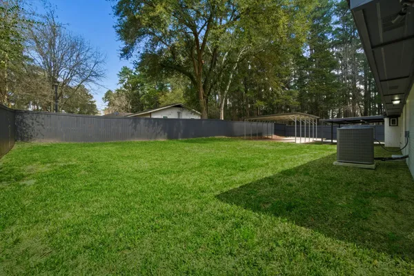 a view of a backyard with a garden
