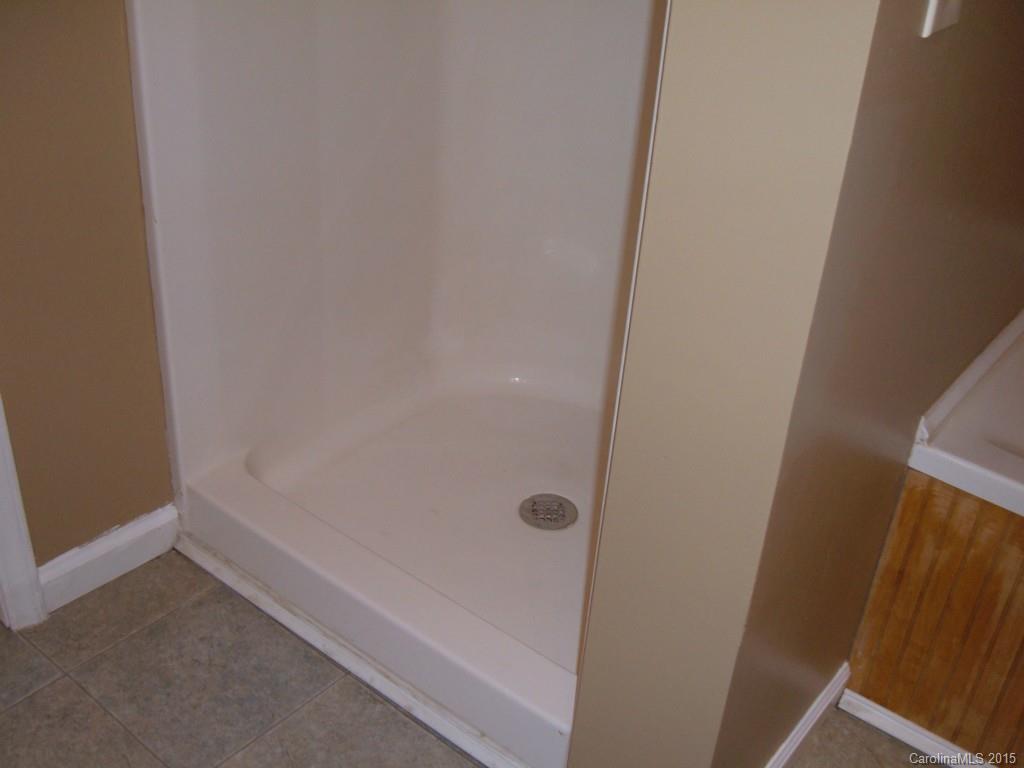 3527 East North Corner Road Lancaster, SC 29720 - Photo 13 of 23 a bathroom with a bathtub