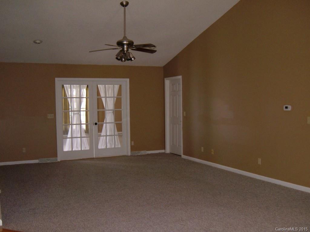 3527 East North Corner Road Lancaster, SC 29720 - Photo 9 of 23 a view of an empty room with a window