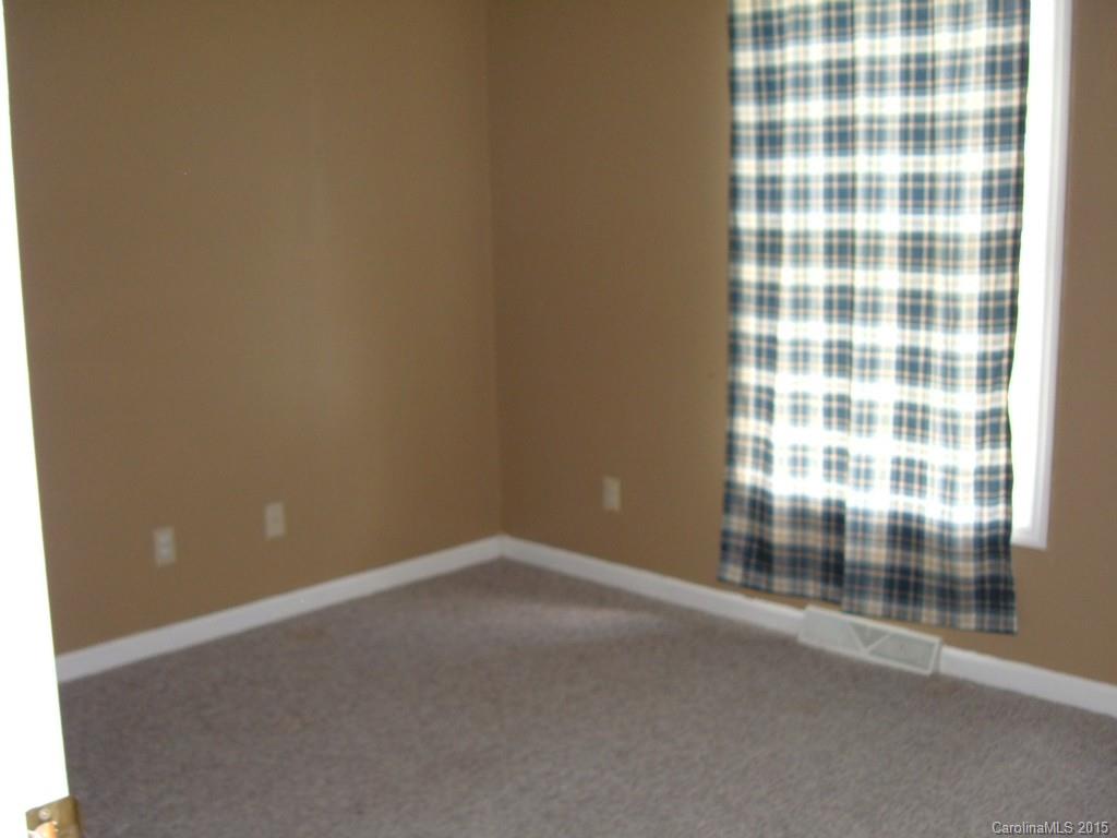 3527 East North Corner Road Lancaster, SC 29720 - Photo 10 of 23 a view of an empty room with a window
