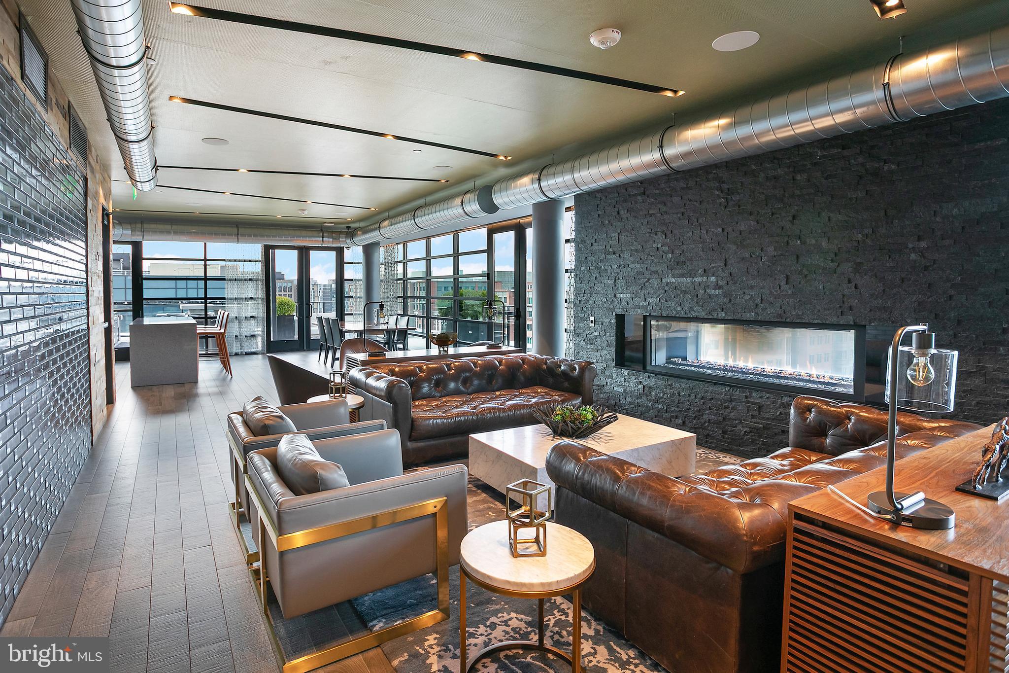 1300 4th Street Southeast, Unit 901 Washington, DC 20003 - Photo 13 of 27 a living room with furniture and a fireplace