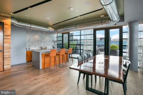 a view of a terrace with couches and potted plants
