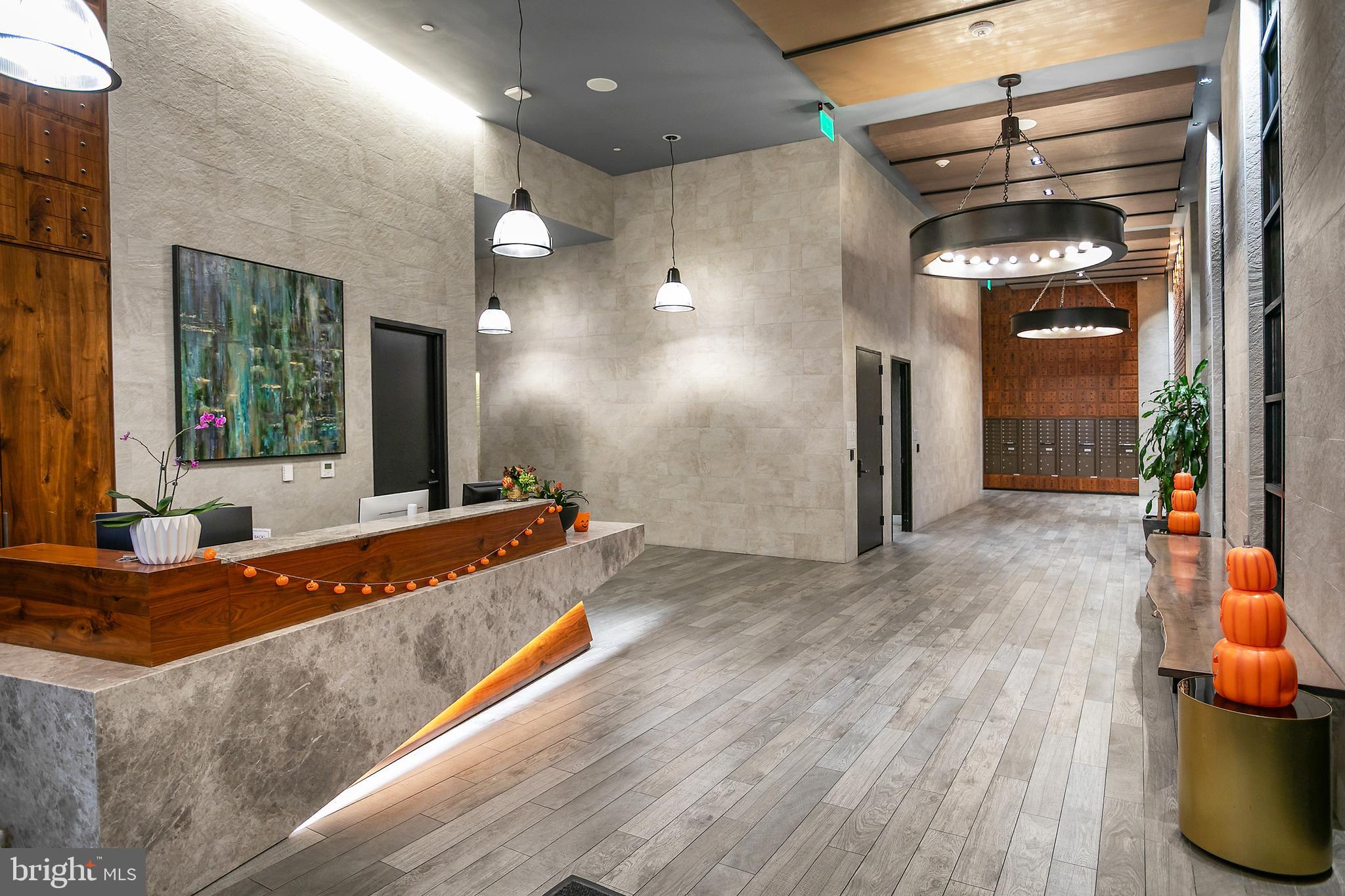 1300 4th Street Southeast, Unit 901 Washington, DC 20003 - Photo 23 of 27 a large room with wooden floor