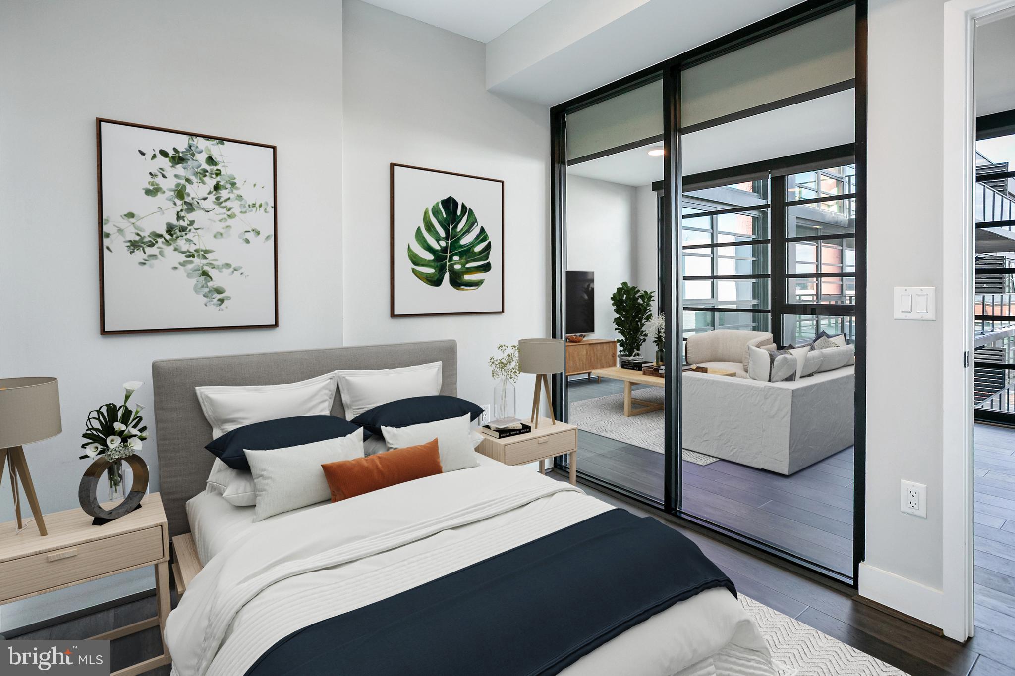 1300 4th Street Southeast, Unit 901 Washington, DC 20003 - Photo 6 of 27 a bedroom with a bed and a couch