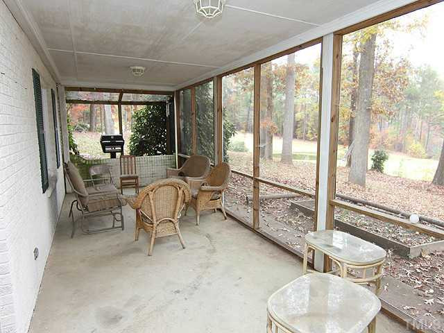 5238 Summit Ridge Drive Durham, NC 27712 - Photo 11 of 14 Screened Porch overlooks 15th Green @ Umstead Pines Golf Course Screened Porch