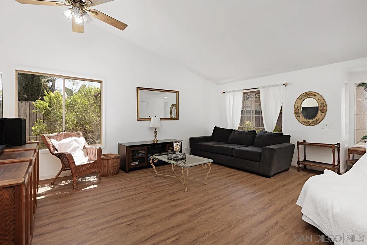 1505 Avenida Oceano Oceanside, CA 92056 - Photo 6 of 26 a living room with furniture and a large window