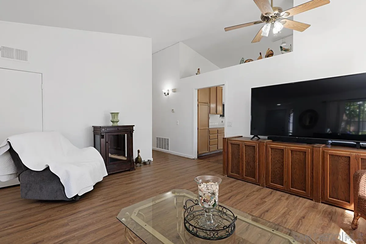 1505 Avenida Oceano Oceanside, CA 92056 - Photo 7 of 26 a living room with furniture and a fireplace