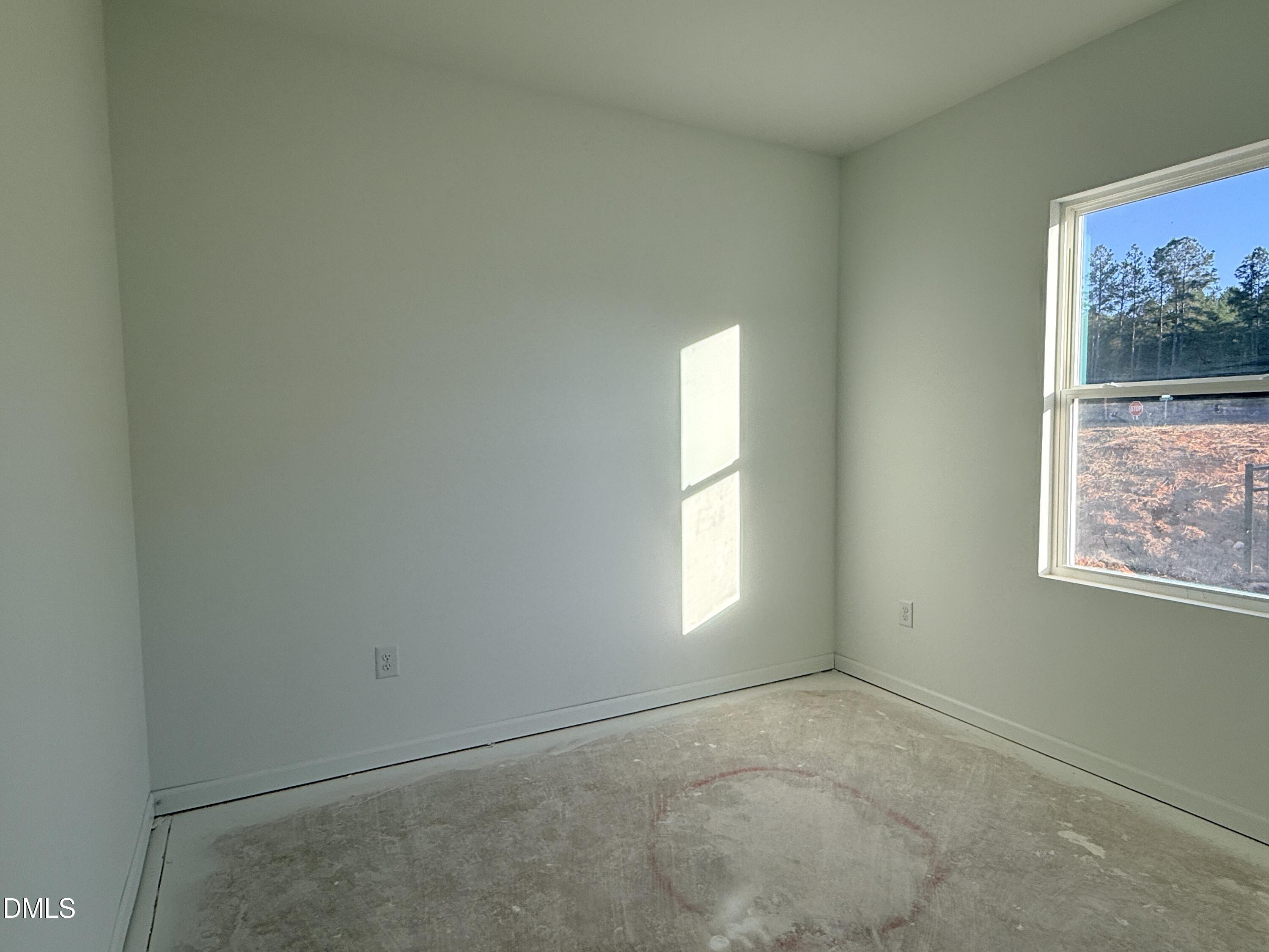 6726 Jersey Road Middlesex, NC 27557 - Photo 12 of 23 a view of empty room with windows