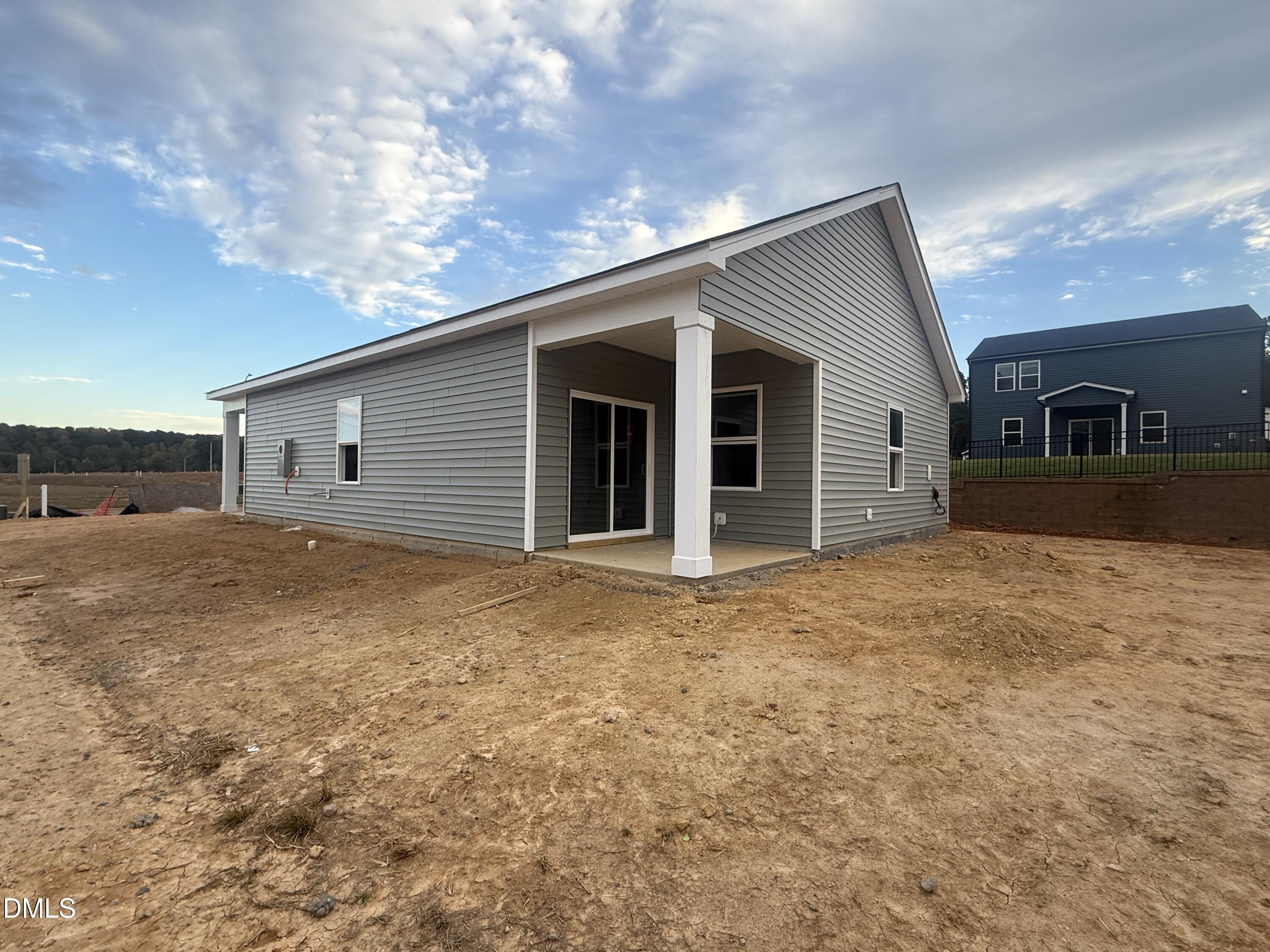 6726 Jersey Road Middlesex, NC 27557 - Photo 17 of 23 a view of a house with a yard