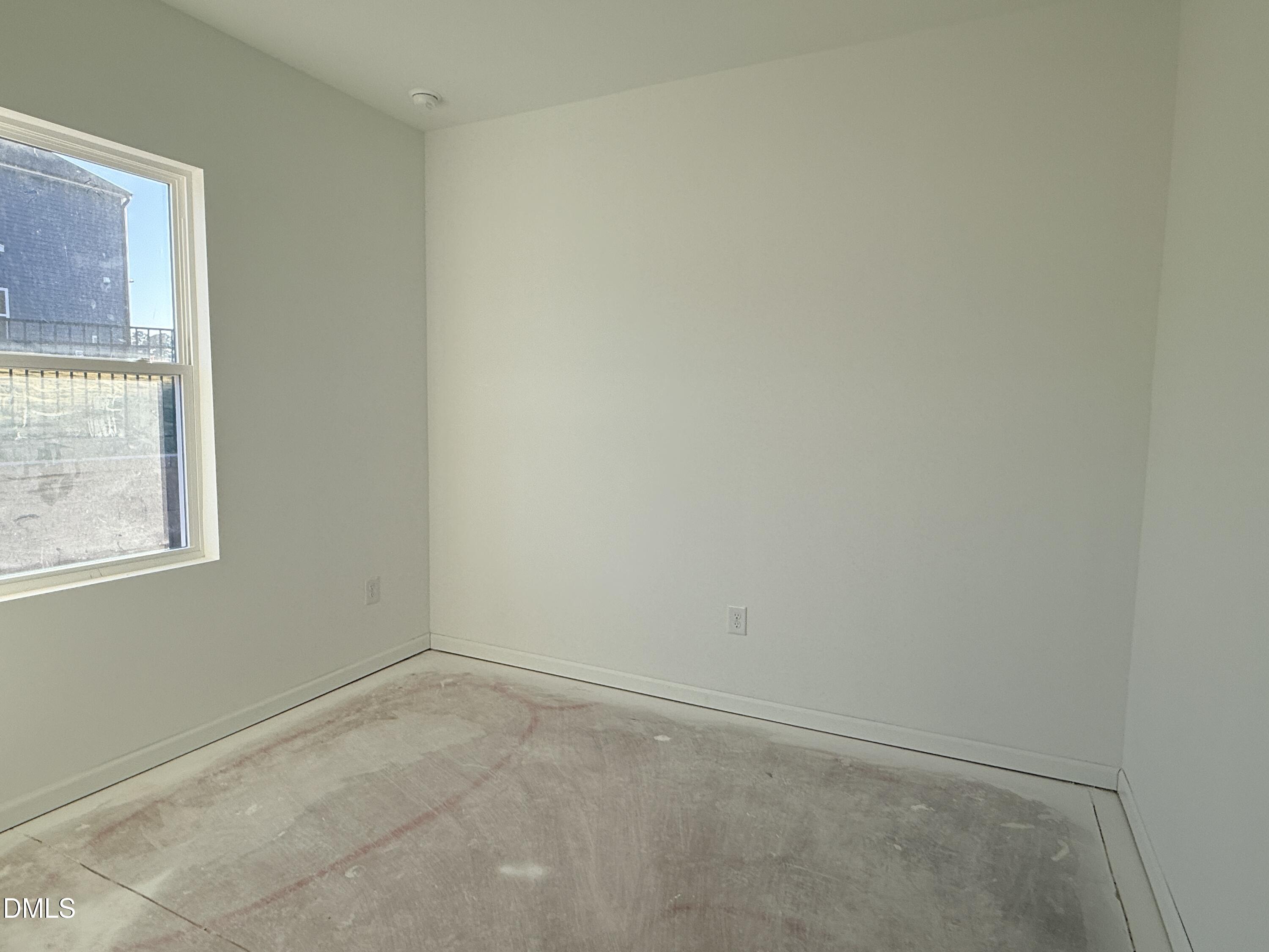 6726 Jersey Road Middlesex, NC 27557 - Photo 9 of 23 an empty room with a window