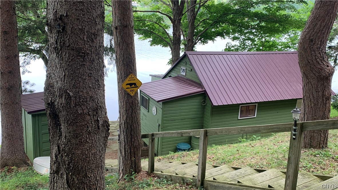 5299 Paddleford Road Eaton, NY 13334 - Photo 1 of 1 Looking from the road to the cabin