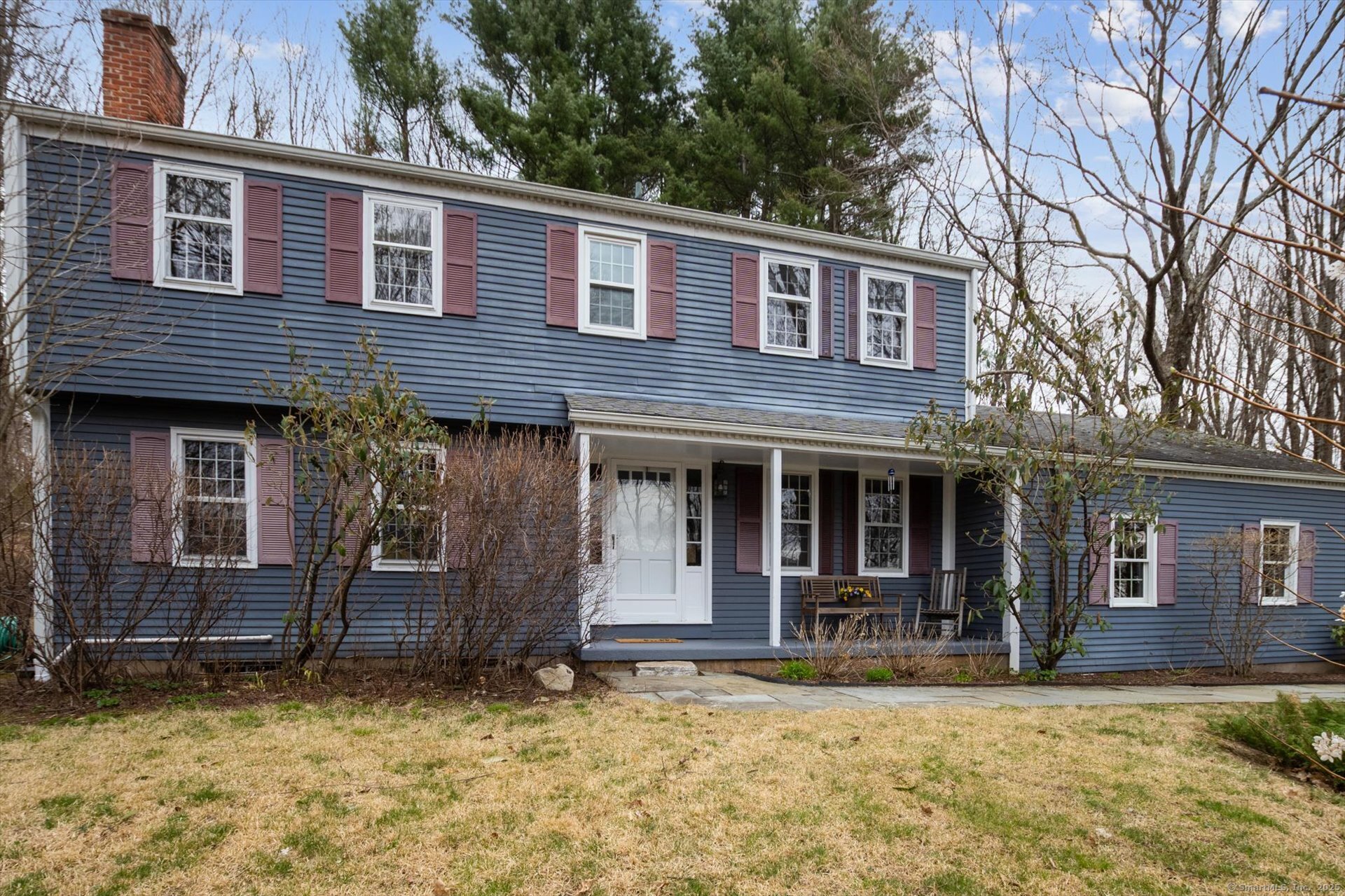 front view of a house with a yard