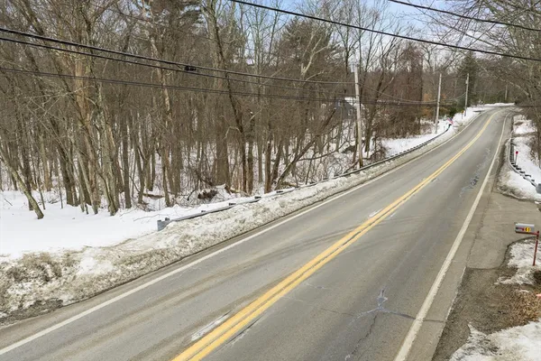 a view of a road with a snow on the road