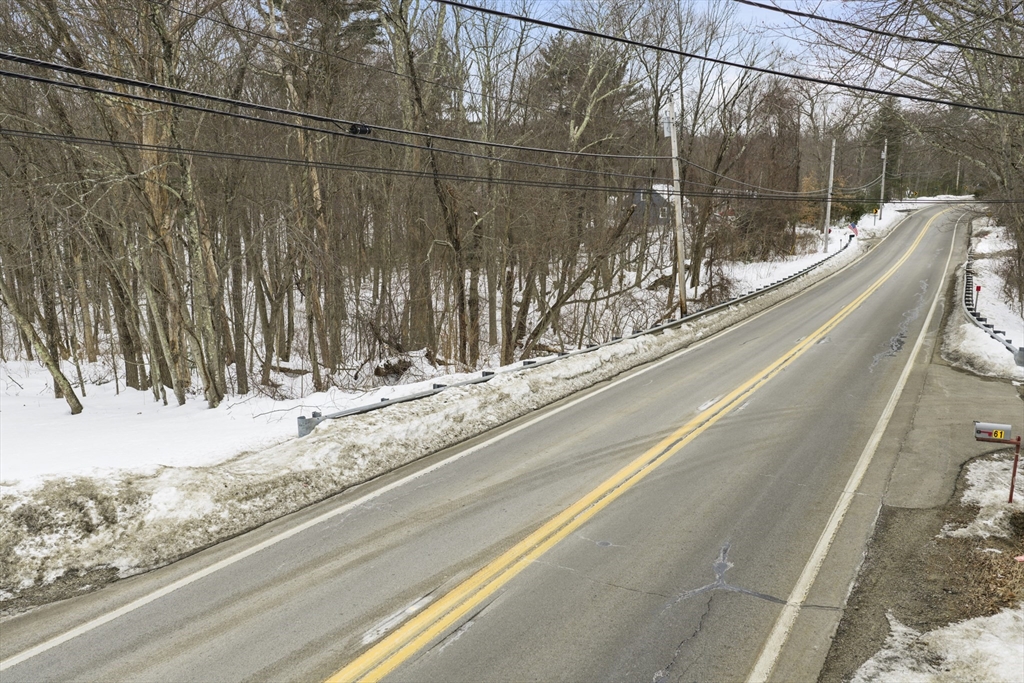 a view of a road with a snow on the road