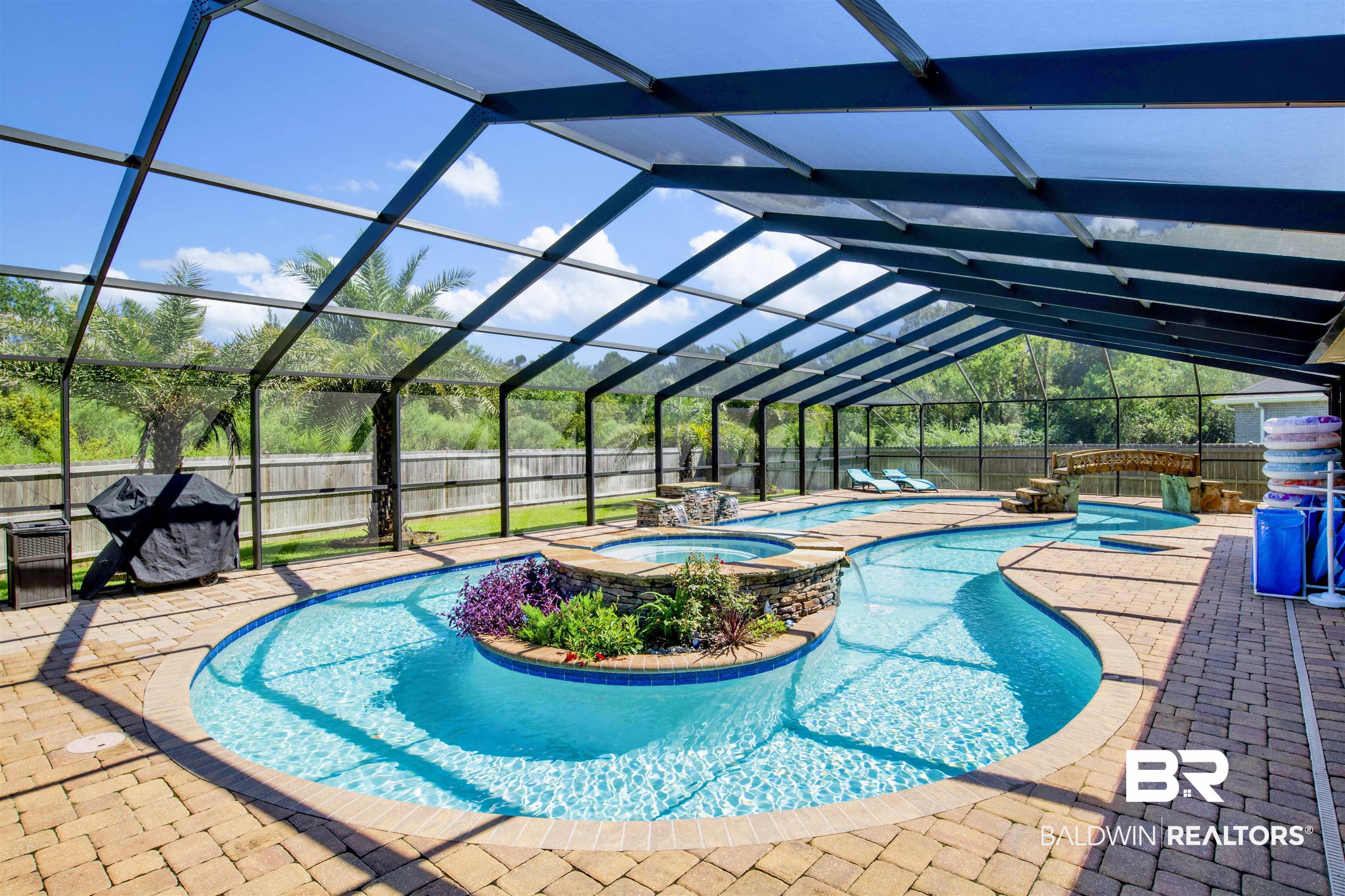 4196 Inverness Circle Gulf Shores, AL 36542 - Photo 31 of 43 View of swimming pool featuring a lanai, a patio area, and an in ground hot tub