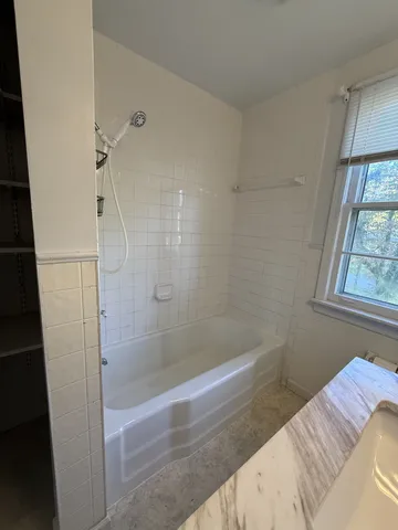 a bathroom with a bathtub