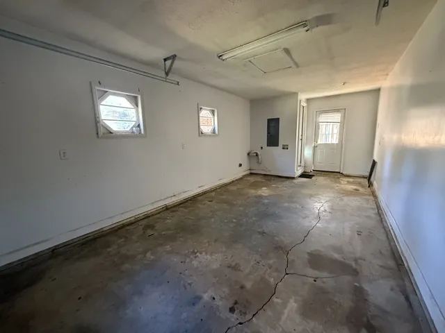 an empty room with windows