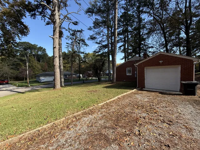 a house with trees in front of it