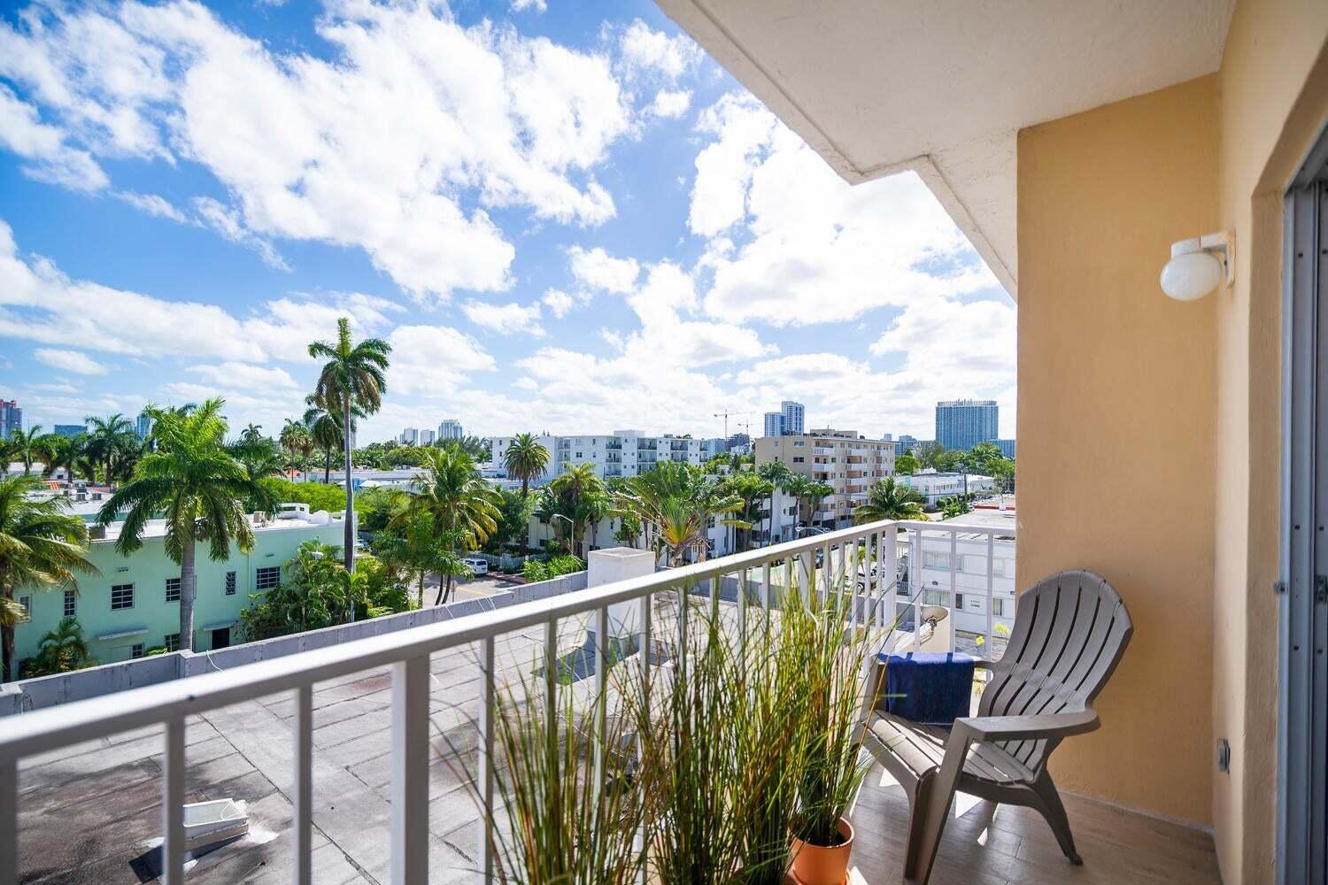 1605 Pennsylvania Avenue, Unit 502 Miami Beach, FL 33139 - Photo 19 of 21 a view of a chair and table in patio