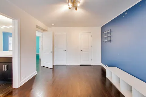 a view of room with hardwood floor