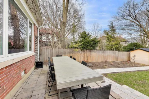 a view of backyard with cabin