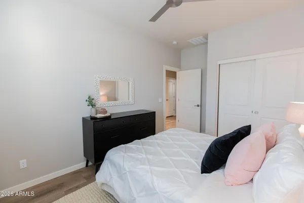 a bedroom with a bed and window