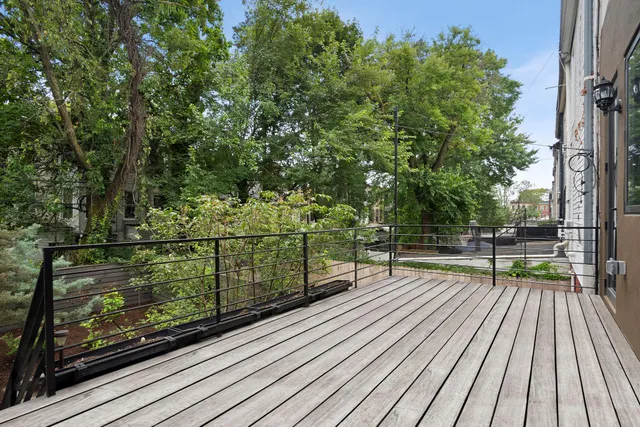 a bedroom with a bed and a desk
