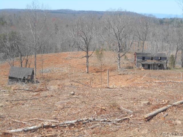 a view of a backyard of the house