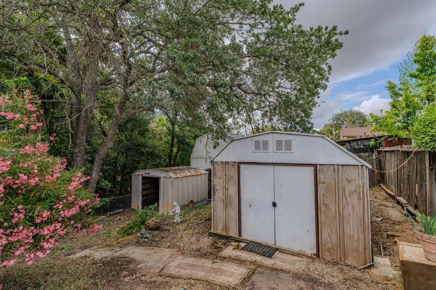 626 Sutter Lane Ione, CA 95640 - Photo 20 of 21 a front view of a house with garden