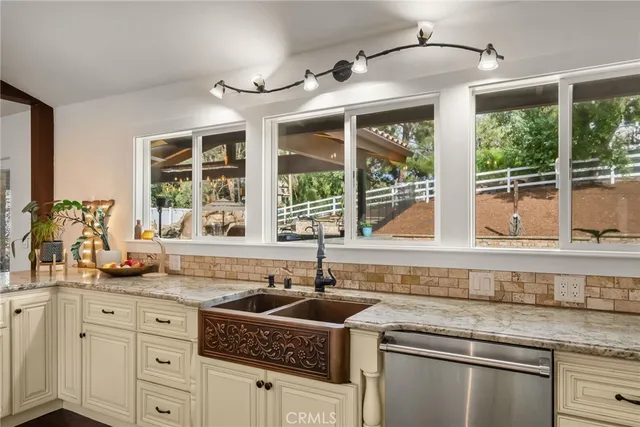 a spacious bedroom with a bed and a window