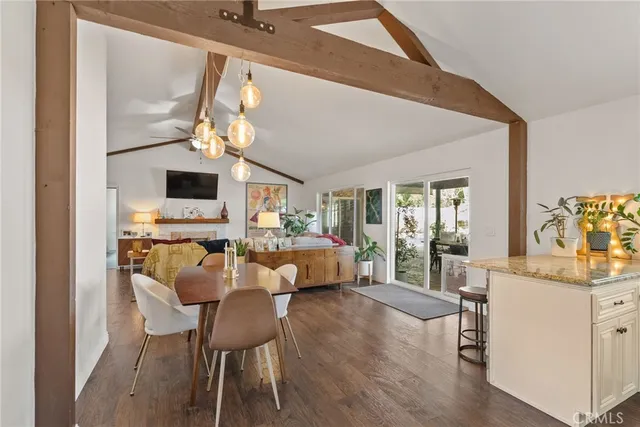 a spacious bedroom with a bed and a window