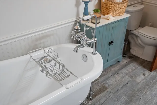 an aerial view of a house with a garden and pool