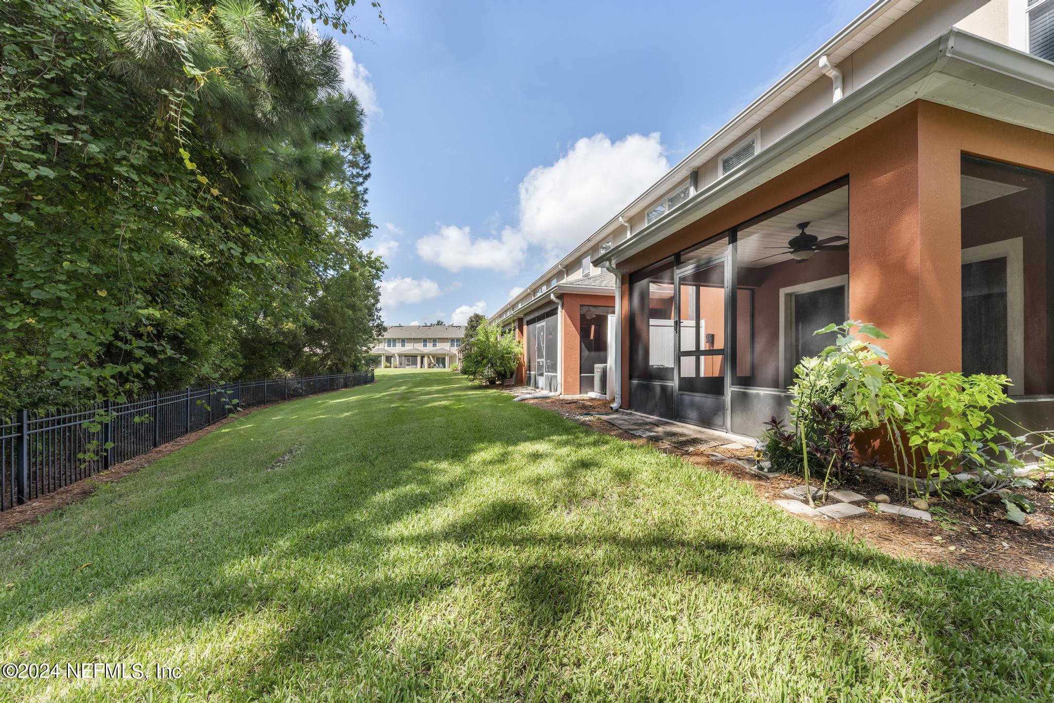 12939 Spring Rain Road Jacksonville, FL 32258 - Photo 29 of 30 a view of a house with backyard and garden