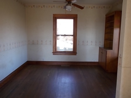 775 North Gorham Road Morris, IL 60450 - Photo 19 of 41 an empty room with wooden floor and windows