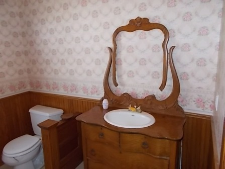 775 North Gorham Road Morris, IL 60450 - Photo 3 of 41 a bathroom with a sink toilet mirror and vanity