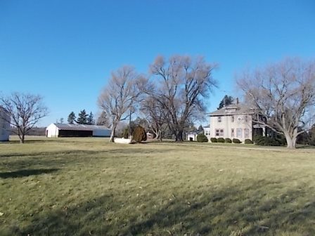 775 North Gorham Road Morris, IL 60450 - Photo 27 of 41 a yellow house with trees in front of it