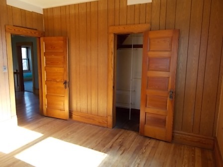 775 North Gorham Road Morris, IL 60450 - Photo 6 of 41 an empty room with wooden floor and closet