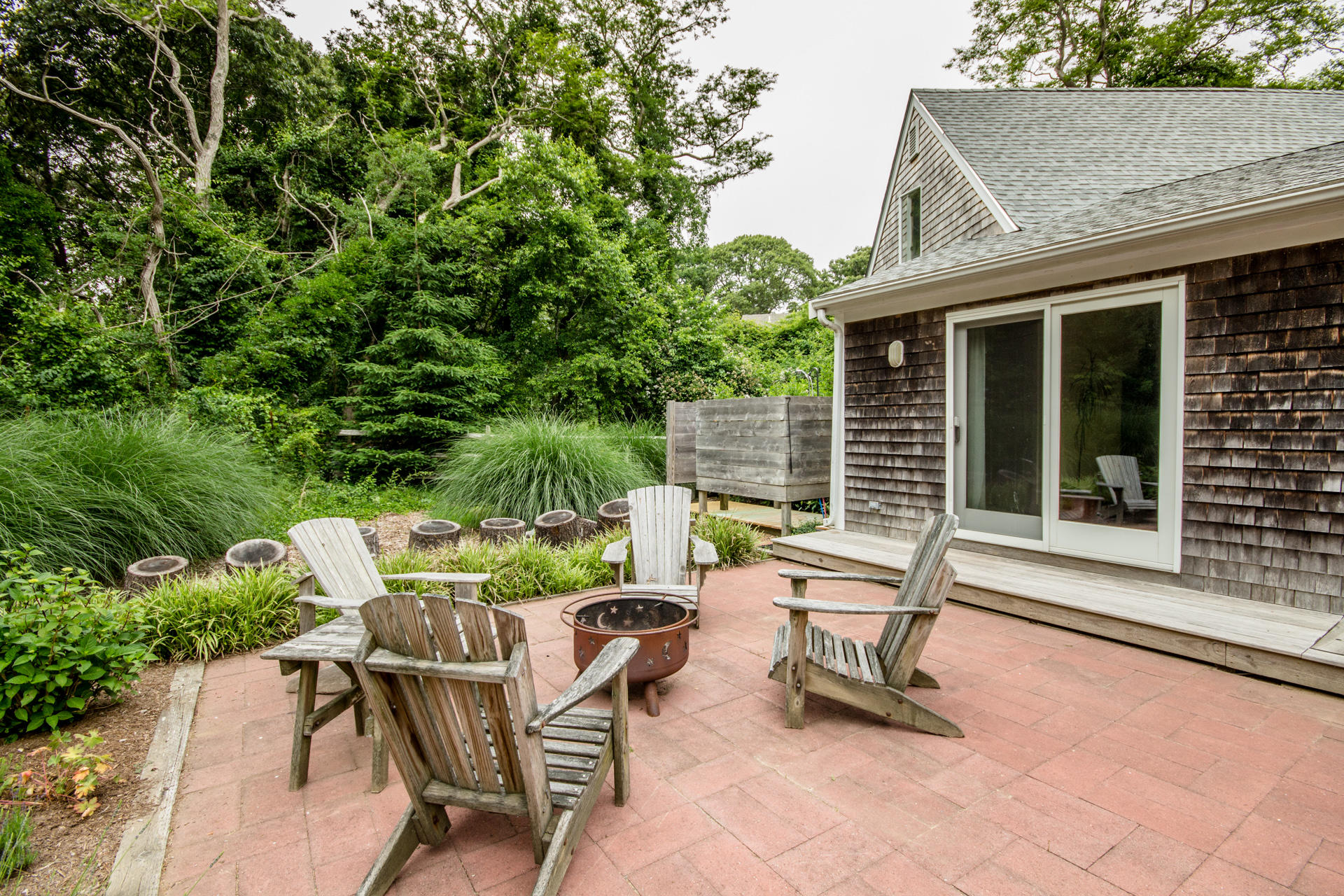 5 Marchants Path Edgartown, MA 02539 - Photo 20 of 45 a view of backyard with seating space and outdoor seating
