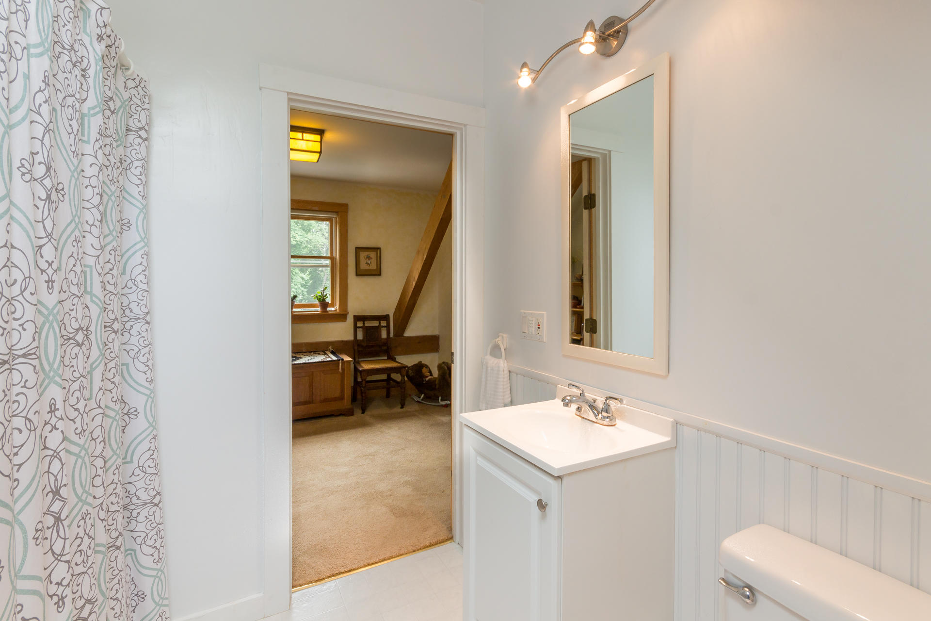 5 Marchants Path Edgartown, MA 02539 - Photo 27 of 45 a bathroom with a sink a toilet and a mirror